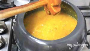 4. Cook and mash dal.