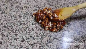 Transfer jagger-peanut mixture on work surface.