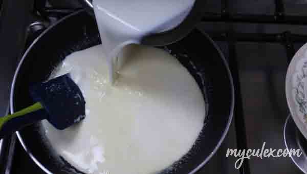 5. Add this milk to the not very hot heavy cream.