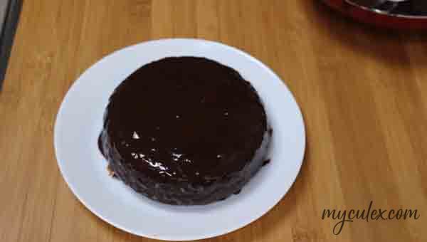 21. Transfer chocolate cake onto a board or plate.