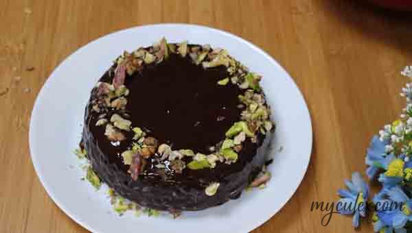 22. Decorate Chocolate cake with nuts and choco chips