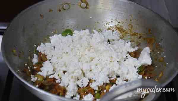 8. Add chopped grated paneer. Sauté