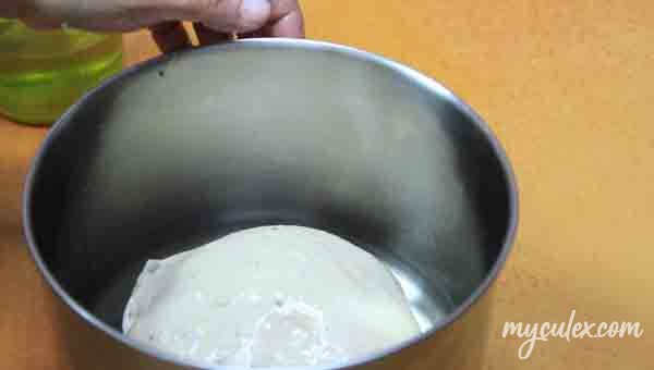 10. Apply oil and keep dough in a greased bowl in warm place for 1st proofing (rise)