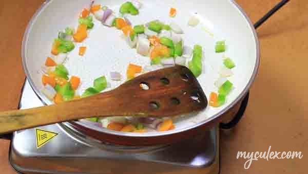 4. Sauté the bell peppers and onions.