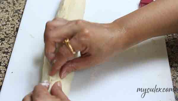 18. Apply water on the edges and pinch.