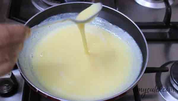 3. Heat and stir milk till it thickens. Switch off flame.