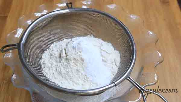 1. In a bowl sift both flours, baking powder, baking soda and salt.