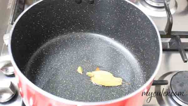 10. Heat oil in a cookpot & add whole spices.
