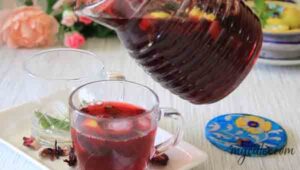 10. Serve karkadeh in glass with ice.