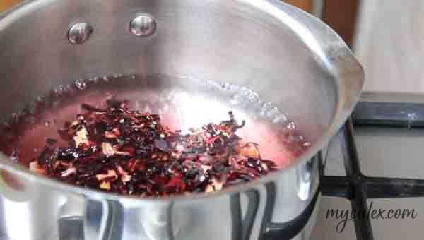 2. When water comes to a boil add Hibiscus dried flowers. Boil for 2 minutes.