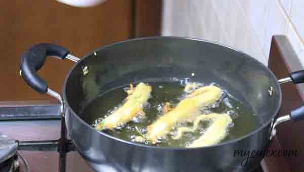 9. Deep fry mirchi pakora till half done