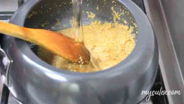 7. Add water and a pinch of salt. Fada lapsi / Gur Daliya